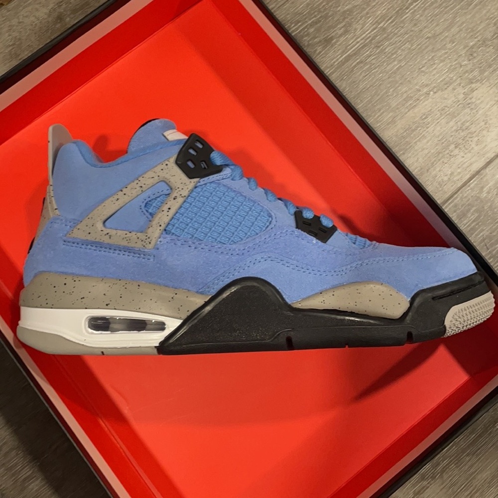 Brand new Jordan 4 Retro University Blue Gradeschool